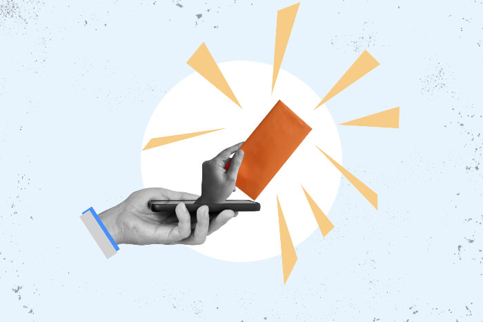Montagem com um uma mão segurando um envelope saindo de uma tela de celular, explicando o que é e-mail marketing.